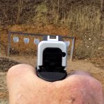GLock 48 sight picture against steel plate rack