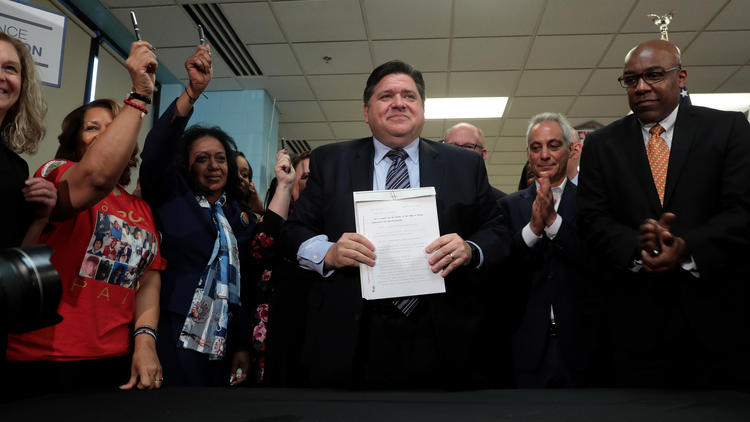 J.B. Pritzker after signing Firearm Registration bill