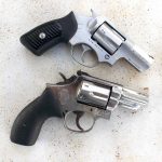 Two snubnose revolvers with closed cylinders