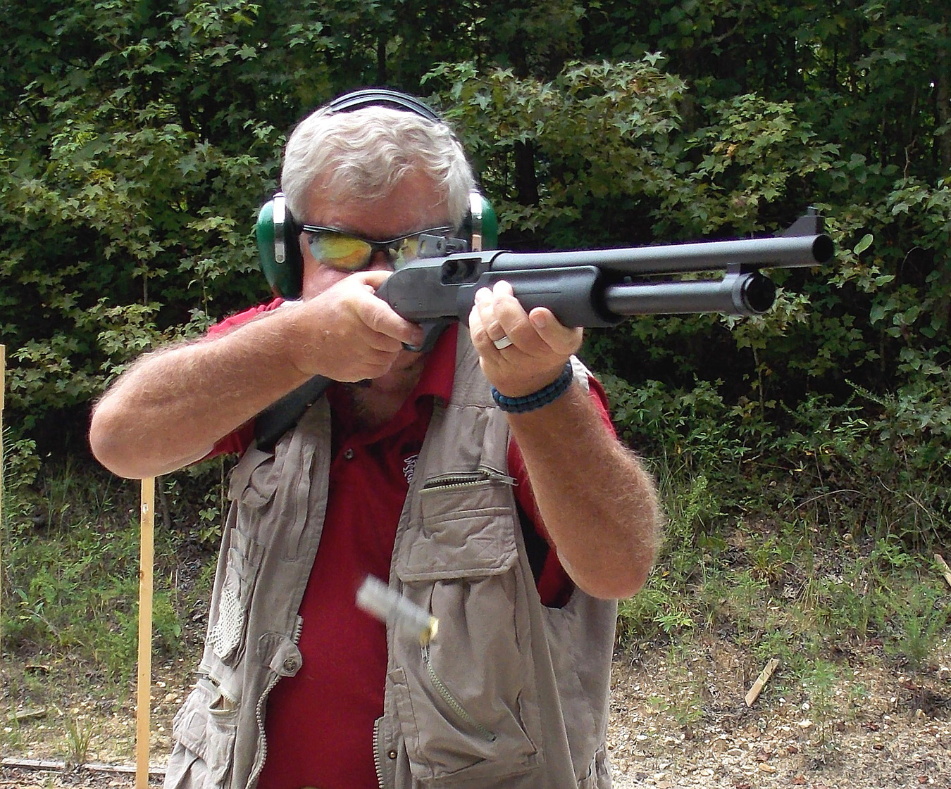 Bob Campbell shooting a pump shotgun