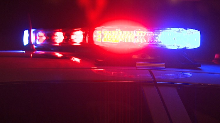Red and blue lights on top of a police car