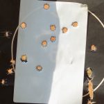 Paper target with multiple bullet holes