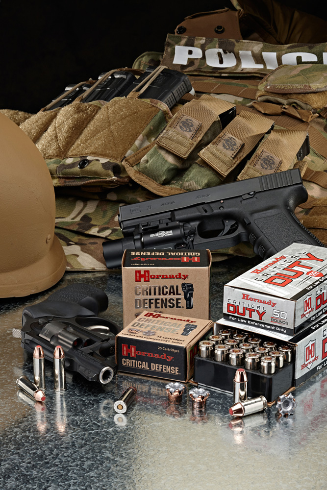 Flack vest, pistol, revolver, and Hornady Critical Duty ammunition box