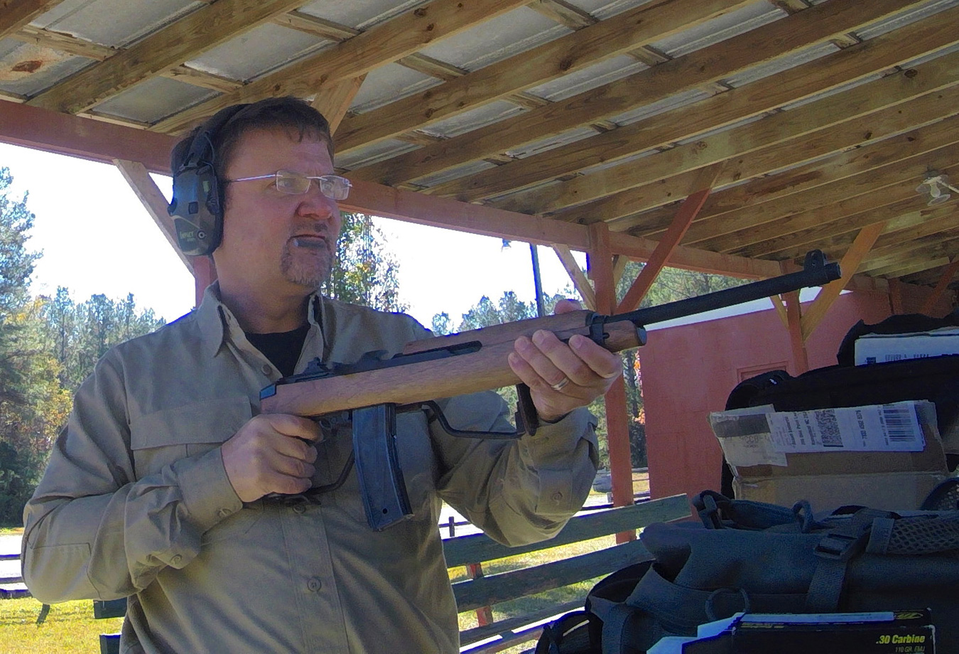 Robert sadowski shooting a M1 carbine rifle with the stock in the folded position