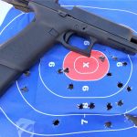 Glock pistol with a 33-round magazine