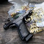 9mm pistol on a ziplock bag with handloads