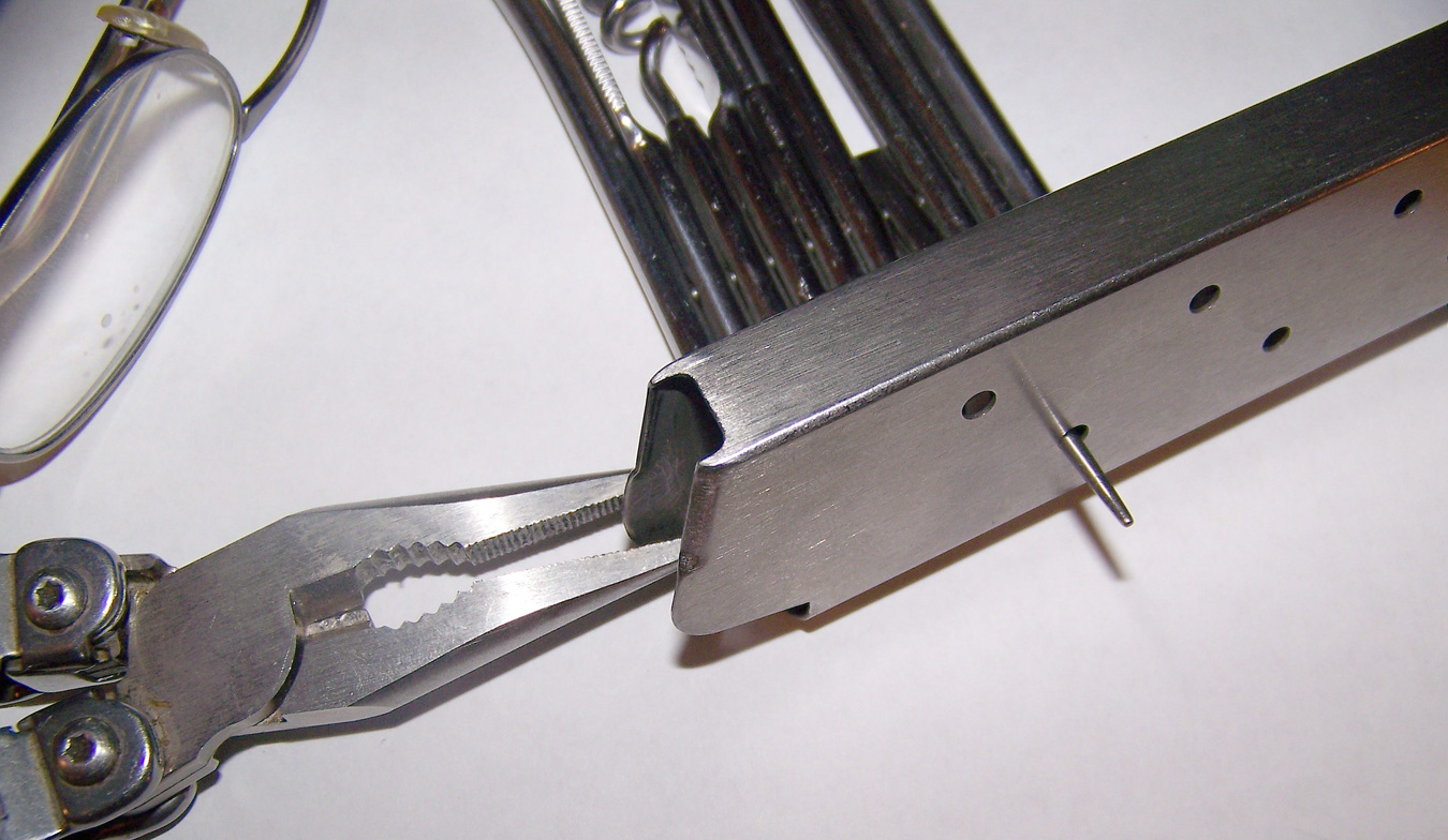 bending the feed lips on a pistol magazine