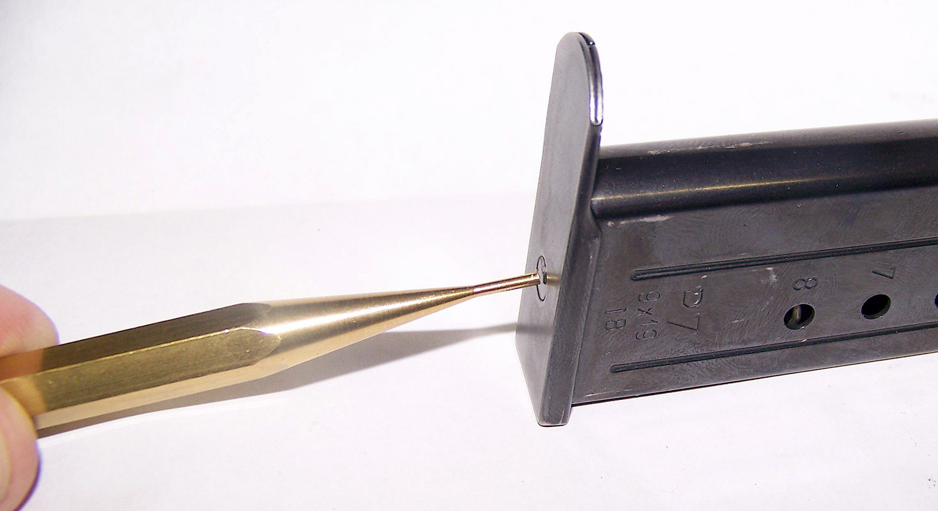 disassembling an HK P7M8 magazine