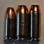 Left to right - 9mm, .45, and 10mm cartridges.