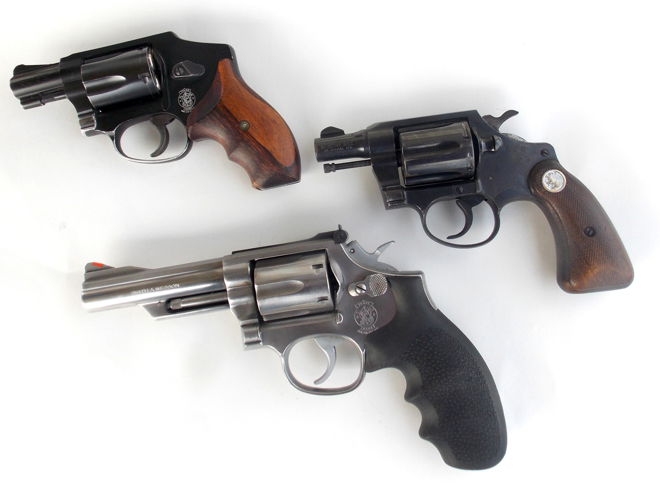 Three .38 revolvers left profile