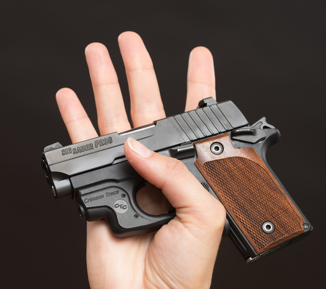 SIG Sauer P238 pistol with a Crimson Trace Laser trigger guard