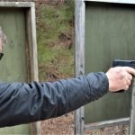 Bob Campbell shooting the taurus TX22 pistol with a one-handed grip