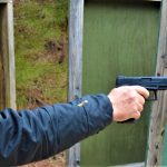 Bob Campbell shooting the taurus TX22 pistol with a one-handed grip