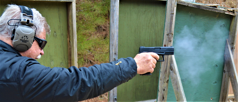 Bob Campbell shooting the taurus TX22 pistol with a one-handed grip