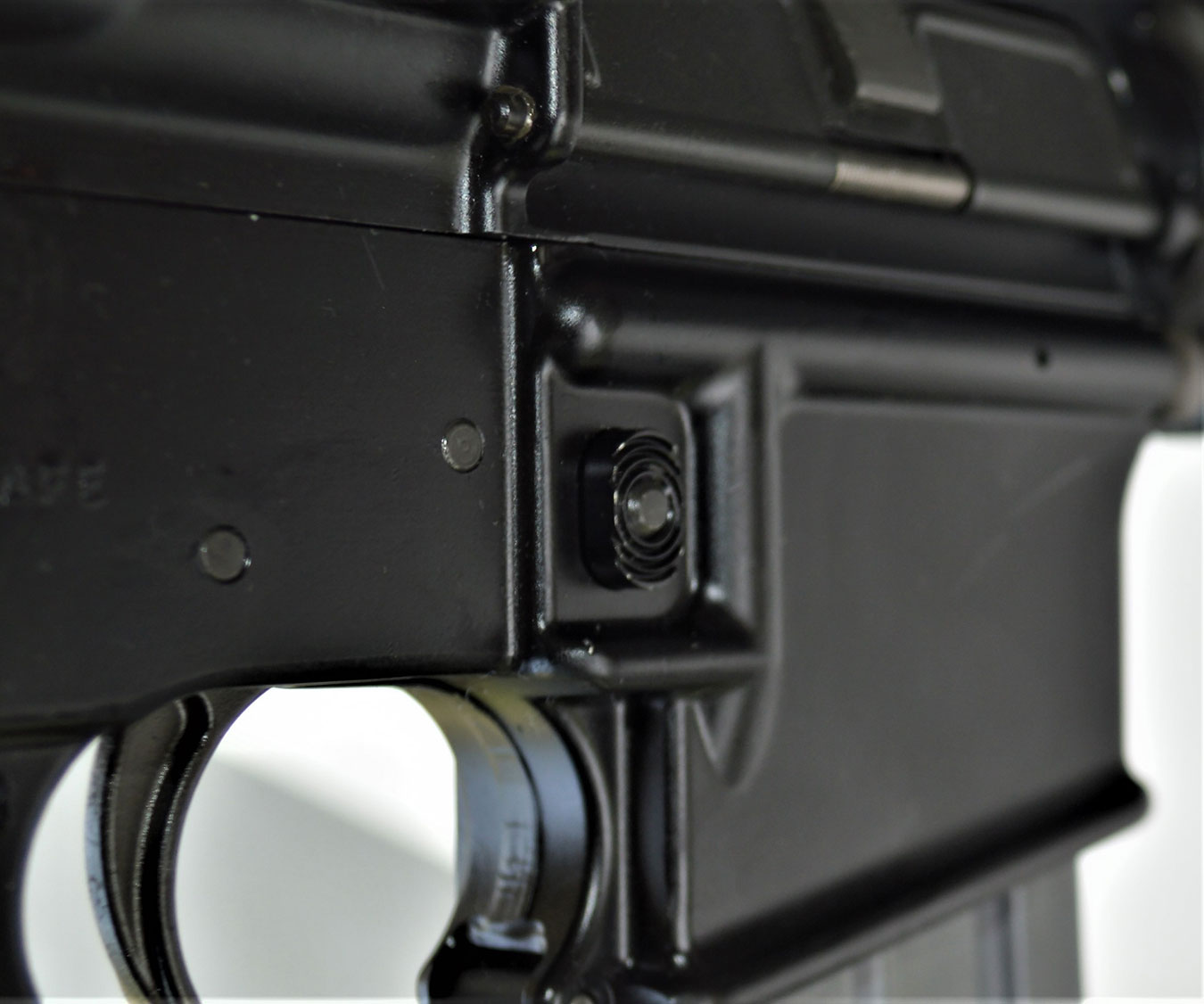 Magazine release on the Colt AR-15 rifle