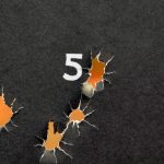 Head of a silhouette target after firing a Remington R1 pistol during a hostage drill