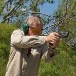 Bob Campbell quickly drawing and firing a pistol