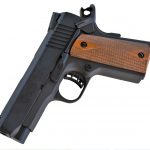 Citadel 9mm 1911 handgun with muzzle pointed down