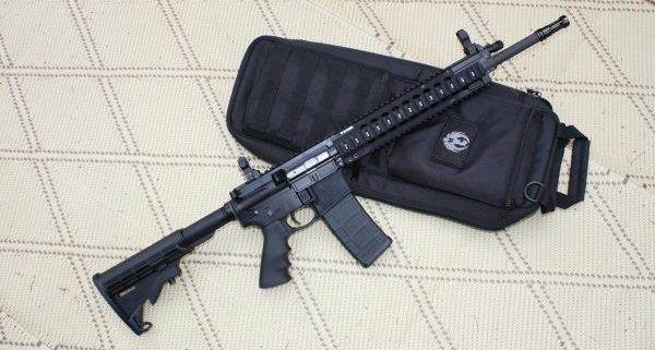 AR-15 rifle on a black case for gun control debate