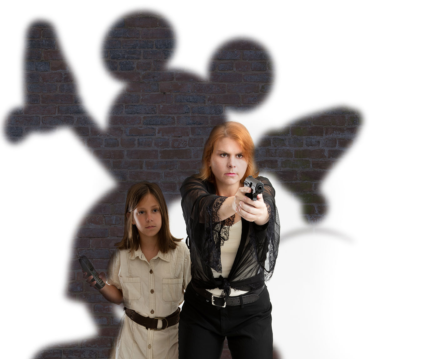 Man holding a gun with Mickey Mouse as the shadow for theme parks