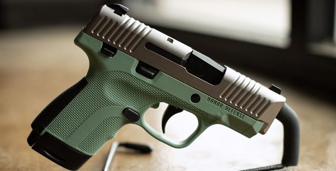 Sea foam green Honor Defense pistol