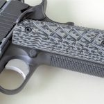 Black and gray Shredder grips on a Guncrafter Commander pistol