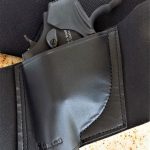 Taurus 856 revolver in a Galco bellyband holster