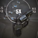 Taurus revolver on a black silhouette target