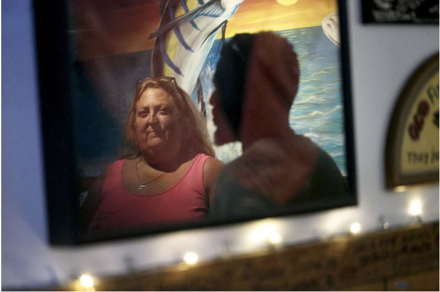 Man and woman in a reflection image