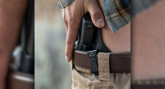 drawing a pistol from a Crossbreed holster