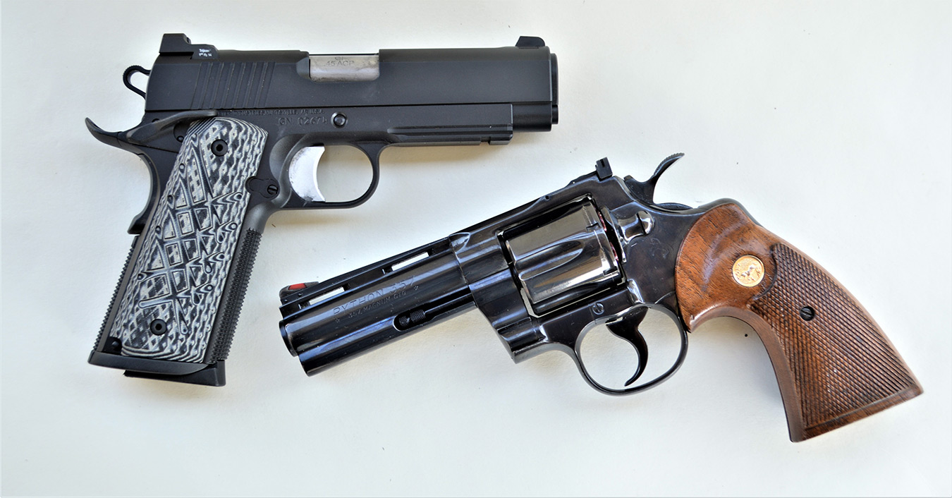 .45 ACP 1911 Commander above, 357 Magnum revolver below