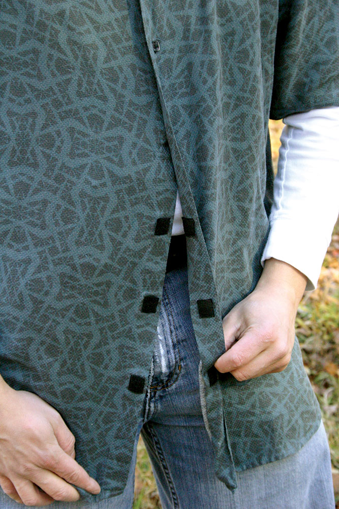 Shirt with the bottom three buttons removed and replaced with Velcro for appendix carry.