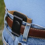 HOlster without reinforcements showing how it collapses under the pressure of a belt