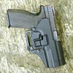 Safariland Automatic Locking System (ALS) holster with polymer pistol inserted