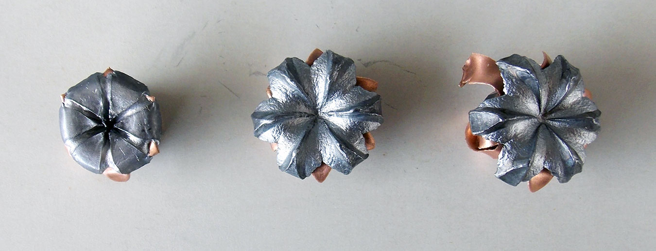Three upset SIG Sauer bullets