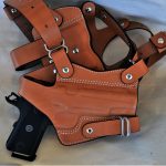 Leather Nightingale shoulder holster with a Guncrafter CCO pistol