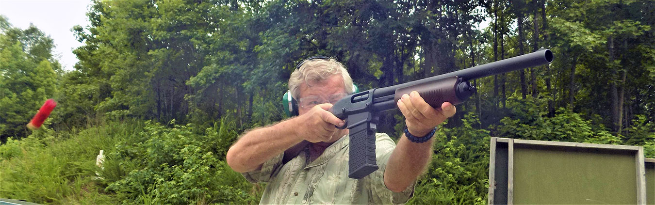 Bob Campbell shooting a magazine fed pump action shotgun