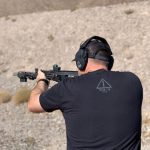 man shooting an Ak-47 at Red Oktober in Las Vegas Nevada