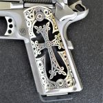 Engraved silver grips on a Les Baer 1911 pistol