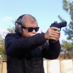 Bob Campbell shooting a SIG Sauer P229RX with red dot sight