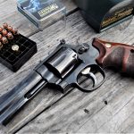 S&W 686 revolver on a wood bench