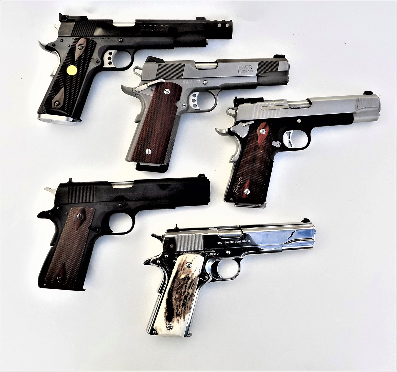 Five models of 1911 handguns