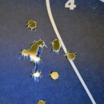 open group of bullet holes from a .380 caliber Beretta handgun