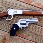 Levr action rifle and revolver both chambered for .45 Colt