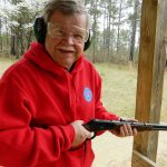 Bob Campbell smiling after shooting a Rossi Frontier rifle