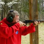 Bob Campbell shooting the Rossi Frontier rifle with an ejected case in the air