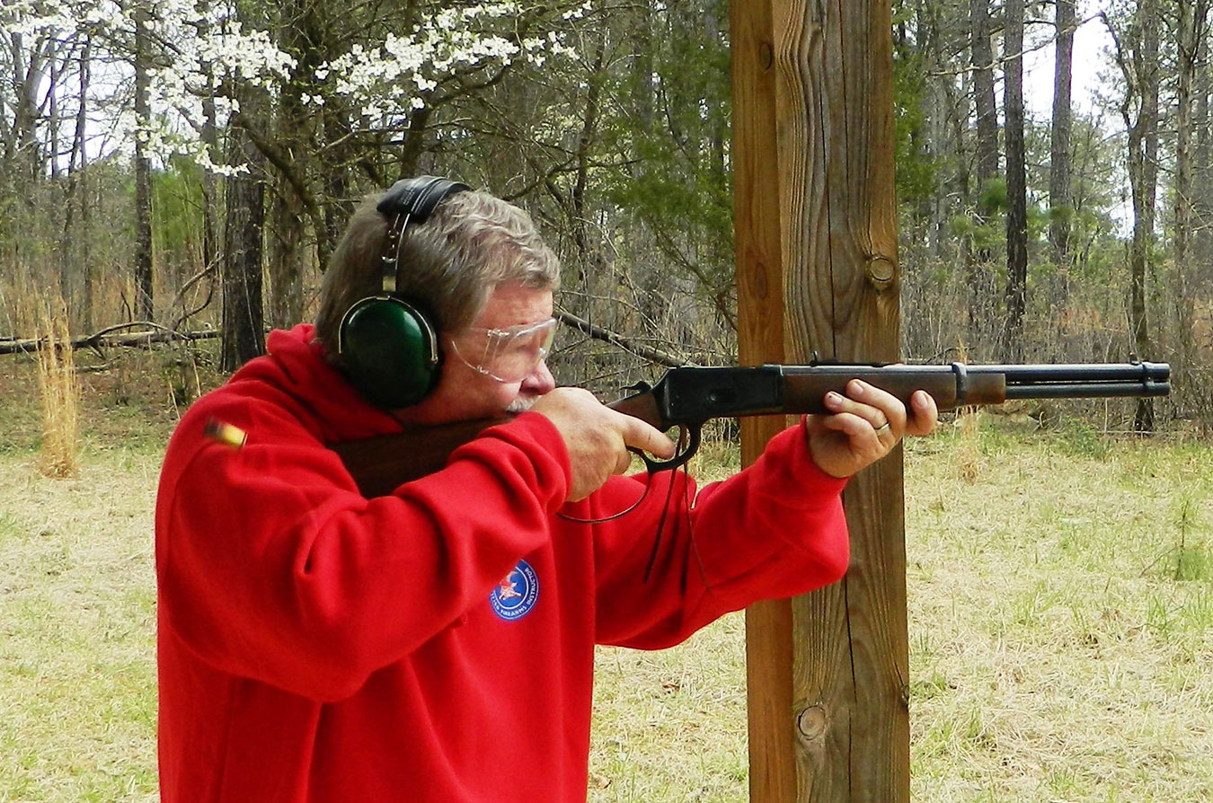 Bob Campbell shooting the Rossi Frontier rifle with an ejected case in the air