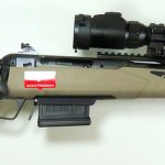 rubber grip enhancers on the rifle's stock