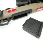 Polymer magazine next to the loading port of the Savage Scout rifle