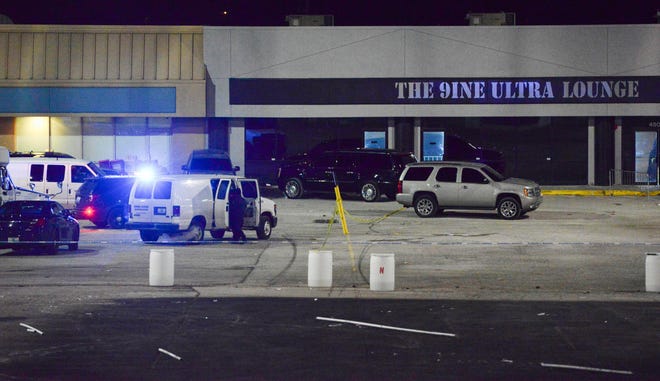 police scene of armed good guys outside the Kansas City's 9ine bar